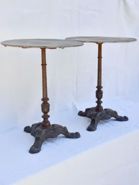 Pair of antique French garden tables with cast iron base