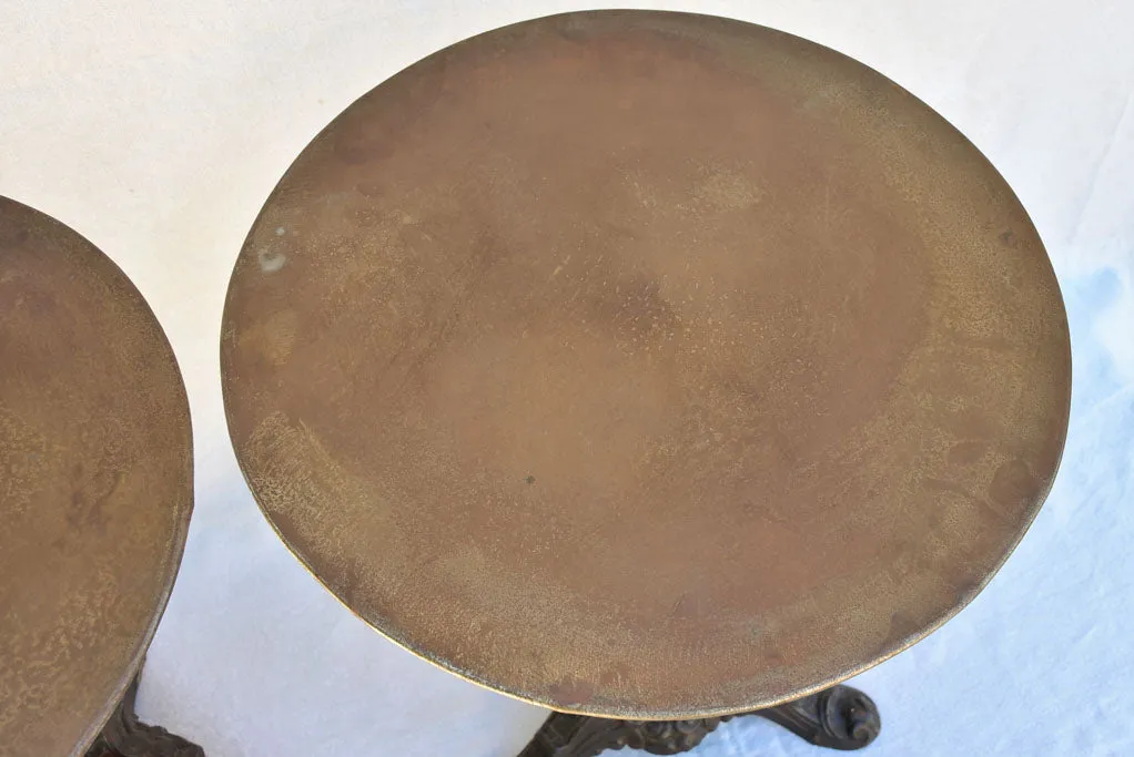 Pair of antique French garden tables with cast iron base