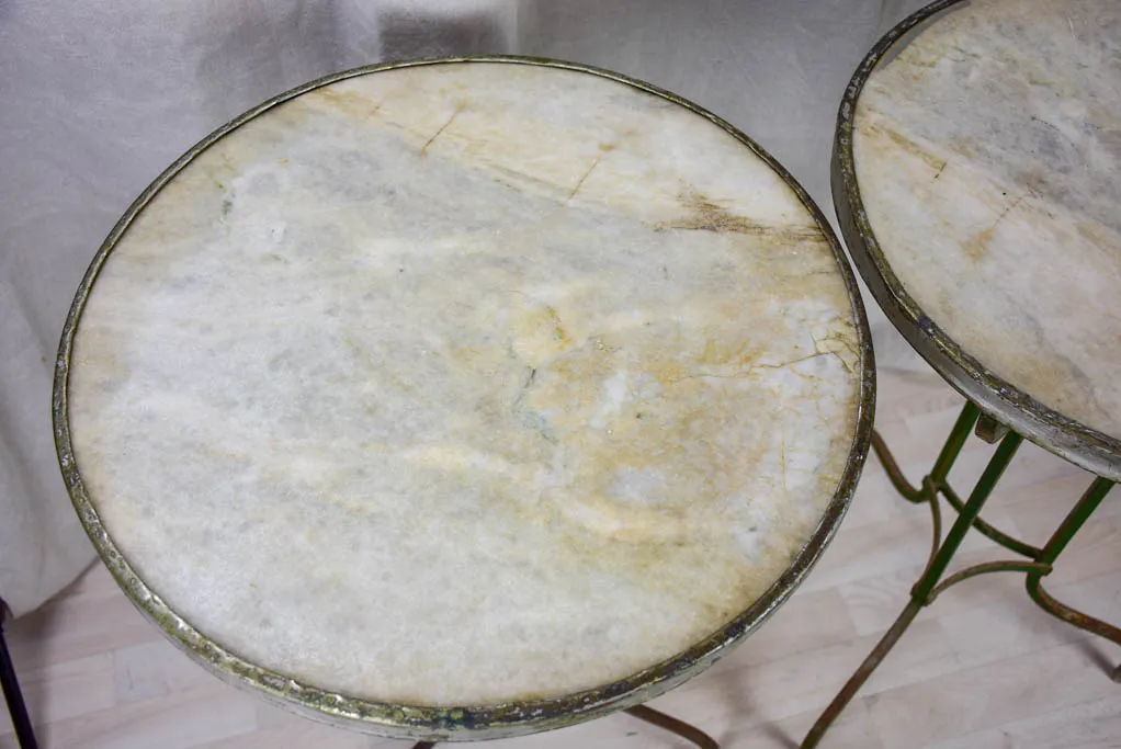 Pair of antique French marble top bistro tables