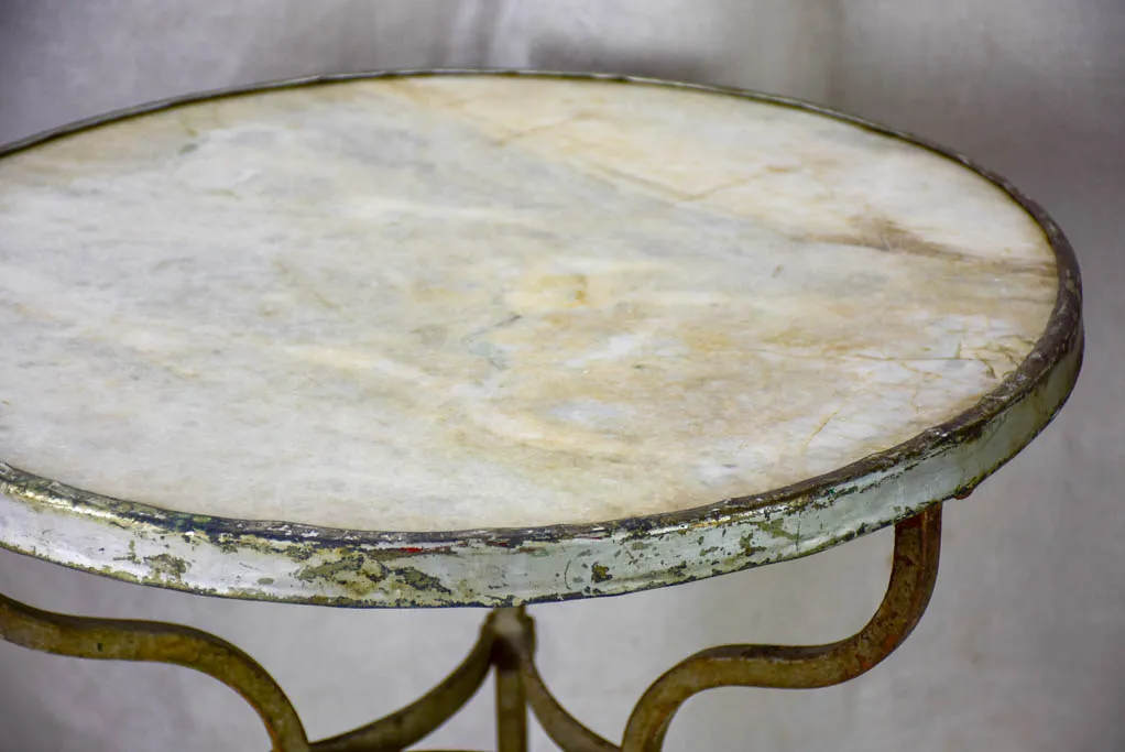 Pair of antique French marble top bistro tables