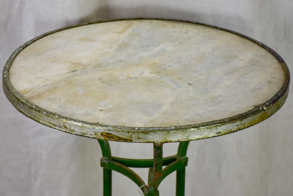 Pair of antique French marble top bistro tables